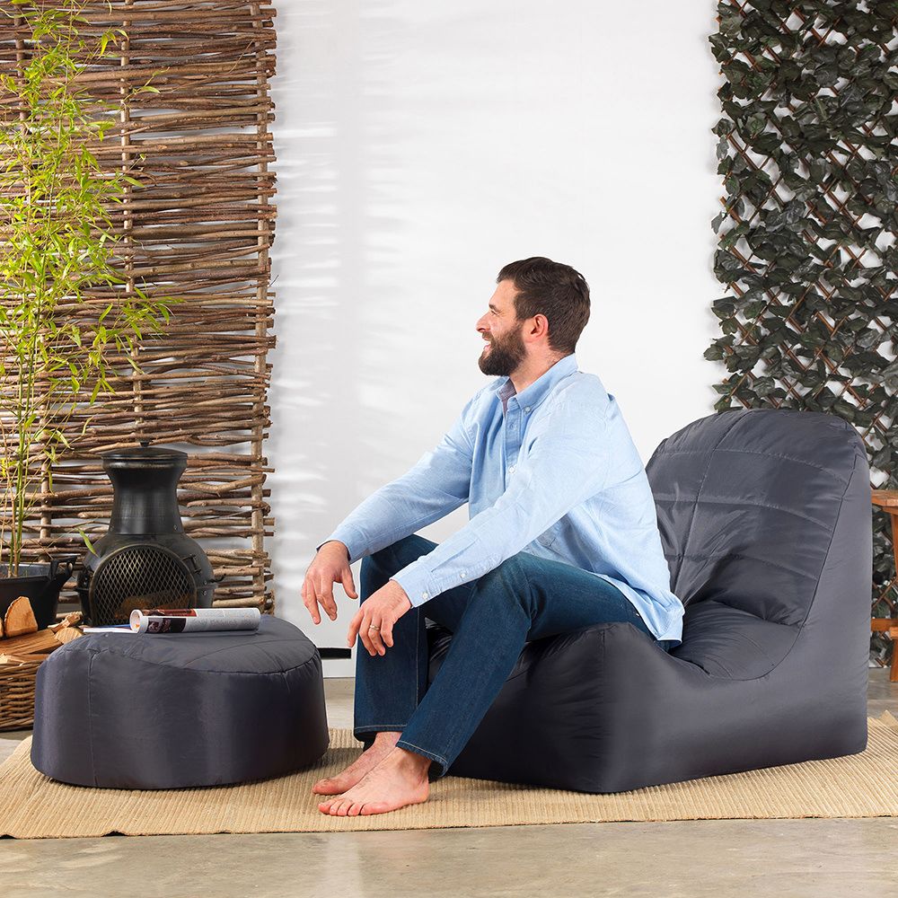 Veeva® Vista Indoor Outdoor Footstool charcoal with male model