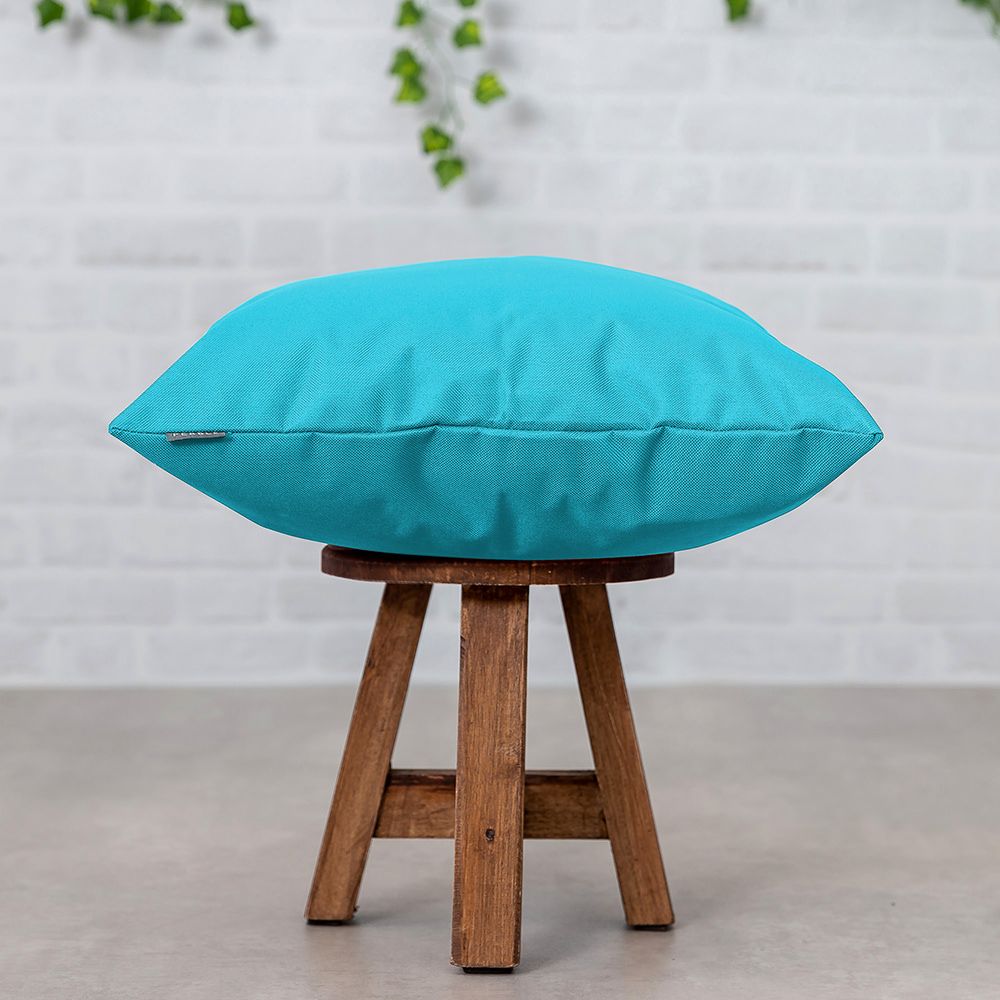 Aqua Outdoor Cushion Lifestyle Side View