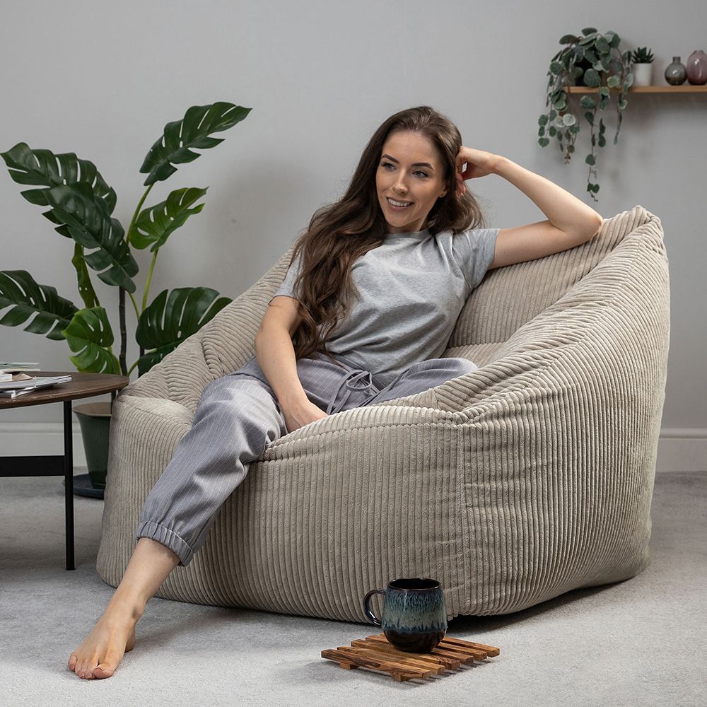icon® Morgan Cord Armchair Bean Bag in stone with model