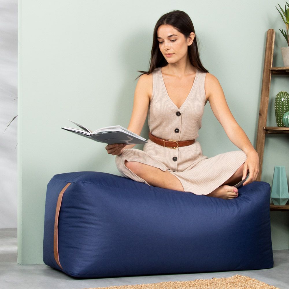 Lady sitting on Navy Blue Bean Bag Bench with handle in living room