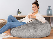 Lady sitting in faux fur bean bag